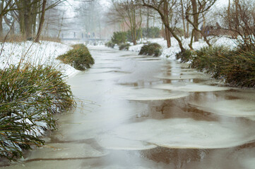 Chunks of ice in a small canal