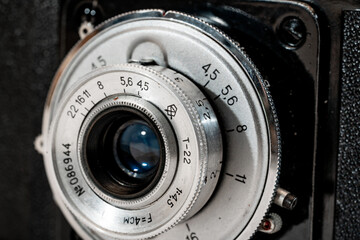 close up of old camera with background