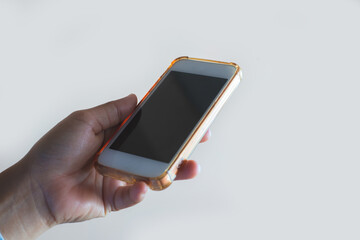 close up of business woman hand using smart phone touch on screen and typing for some searching internet information technology data.