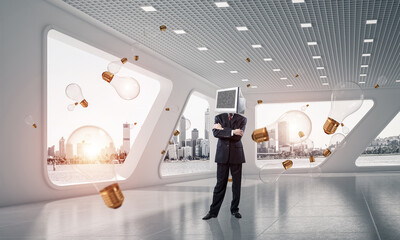 Businessman with monitor instead of head.
