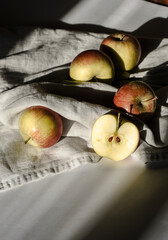 sliced apple on cloth in bright sun