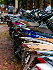 motor scooters parked in a row