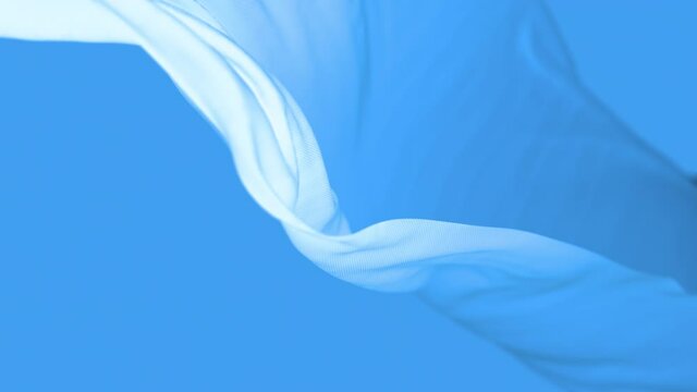 4k Wave satin fabric loop background.Wavy silk cloth fluttering in the wind.tenderness and airiness.3D digital animation of seamless flag waving ribbon streamer riband.