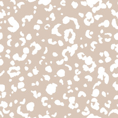 Abstract modern leopard seamless pattern. Animals trendy background. Beige and white decorative vector stock illustration for print, card, postcard, fabric, textile. Modern ornament of stylized skin