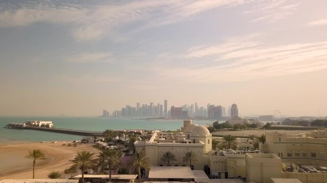 Aerial view of Doha cityscape during sunset, Qatar