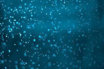 Blue glitter vintage lights background. Blue bokeh background.