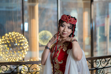 Translation results
Asian girl in national costume. Kyrgyz national women's clothing with...