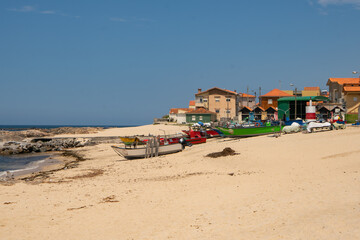Fototapeta na wymiar Fishermen vilage of Vila Cha with fishing boats on the beaches and fishermen houses in Portugal