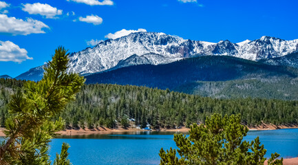 Panorama Snow-capped and forested mountains near a mountain lake, Pikes Peak Mountains in Colorado...
