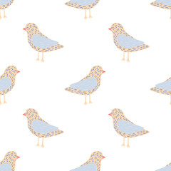 Isolated seamless pattern with hand drawn blue and beige colored dove birs ornament.