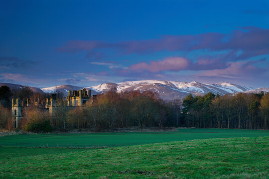 sunset over Dunmore Park House in Falkirk with views to the Ochil hills, Scotland.