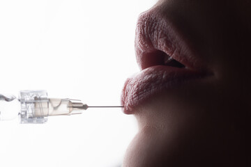 Lips augmentation syringe. Female mouth, hyaluronic acid injection, augmentation. Age changes....