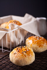 Fresh homemade whole grain burger buns with sesame