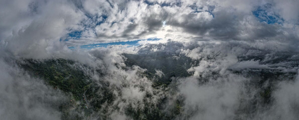 sunrise with clouds above the mountains 