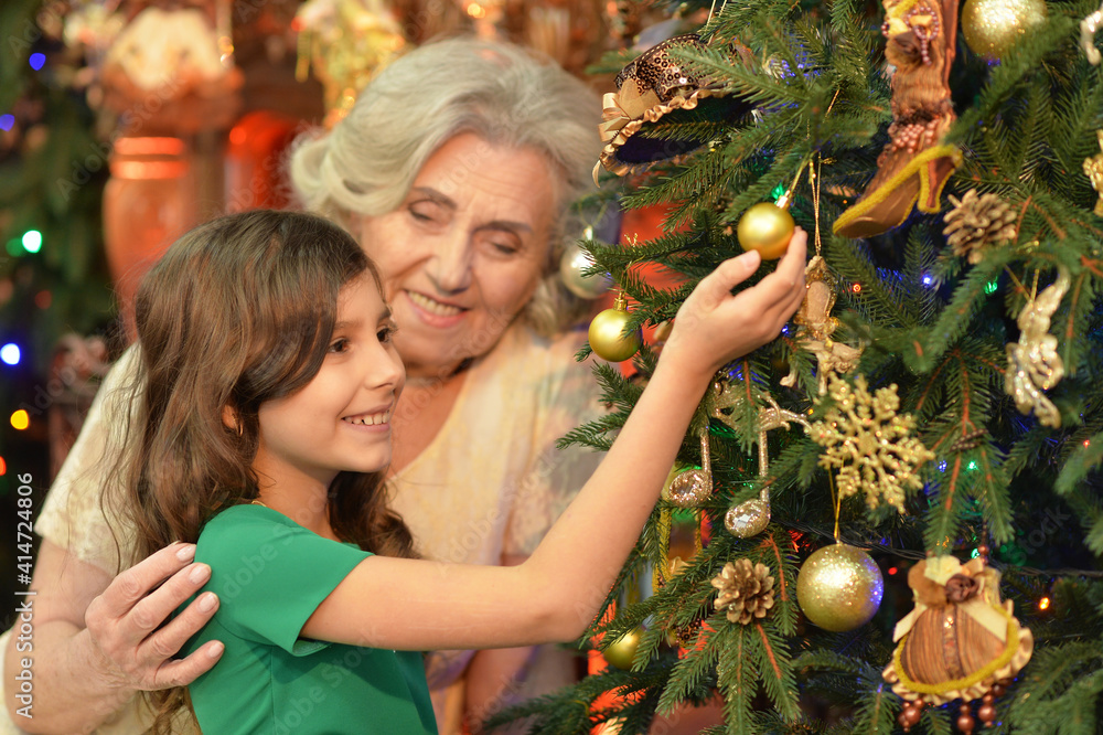 Canvas Prints portrait of smiling little girl with grandmother on christmas