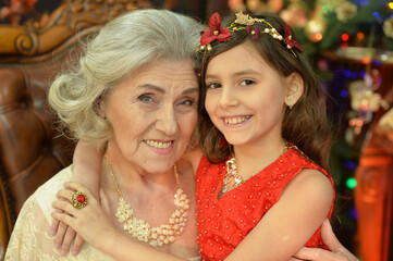 Portrait of a smiling grandmother and her granddaughter