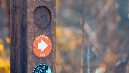 Directional Walking car park marker on a country trial in Autumn