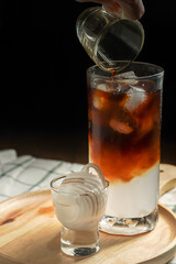 Fresh blending coffee Arabica with sweet coconut juice for health care drinking in home. drinks in...
