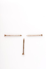 Steel nails 4-inch isolated on white background.