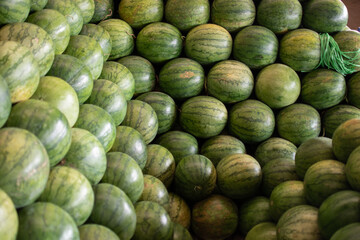 Big fresh watermelons stacked in rural Myanmar
