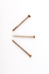 Steel nails 4-inch isolated on white background.