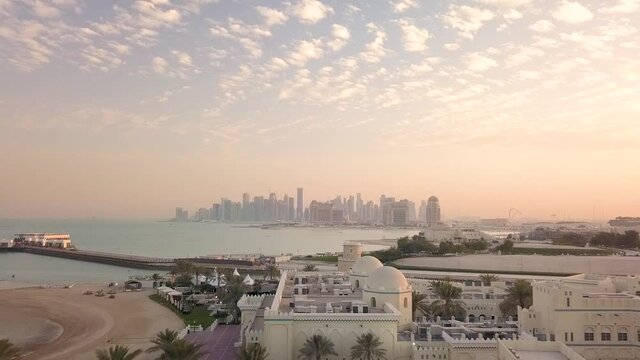 Aerial view of Doha cityscape during sunset, Qatar