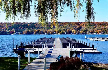 Marina pier with docks on Keuka Lake in Penn Yan, Finger Lakes region, New York. Amazing natural beauty. Late autumn season