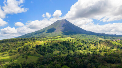 Amazing view of beautiful nature of Costa Rica with smoking volcano Arenal background. Panorama of volcano Arenal, La Fortuna, Costa Rica. Central America.