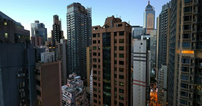 Urban architecture of modern city. Building exteriors of office towers in Hong Kong downtown