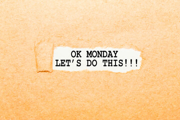 text OK MONDAY LET'S DO THIS on a torn piece of paper, business concept