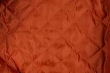 Orange fabric texture can use as abstract background.