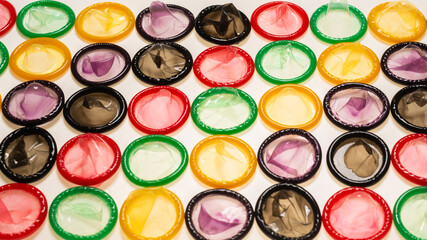 Colorful condoms background.