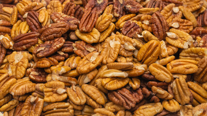 Tasty pecan-nut background. Top view.