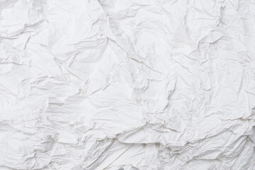 Crumpled white paper background.