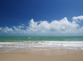 Beautiful tropical sea and sand beach with blue sky in sunny day