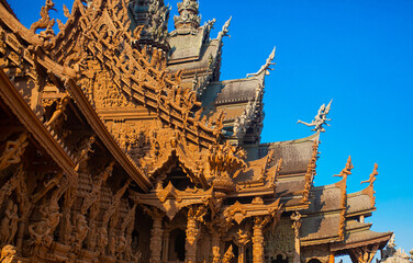 Wooden Temple in Pattaya. Traveling in Thailand. Wooden sculptures of beautiful carved patterns on...