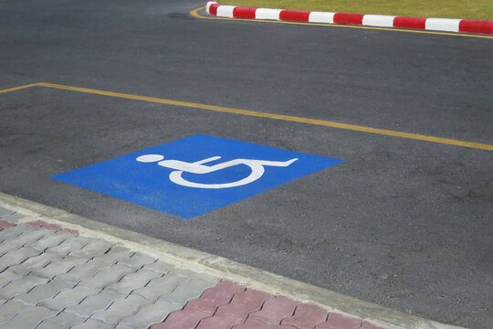 Disabled parking with blue parking sign. Sign and transportation concept.