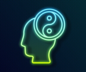Glowing neon line Yin Yang symbol of harmony and balance icon isolated on black background. Vector.