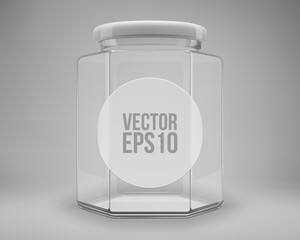 Hexagon glass honey jar with a lid. A transparent jar with a white lid and label.