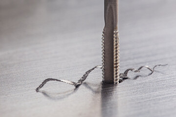 Thread tap. Tap drill steel billet. Working cutter.