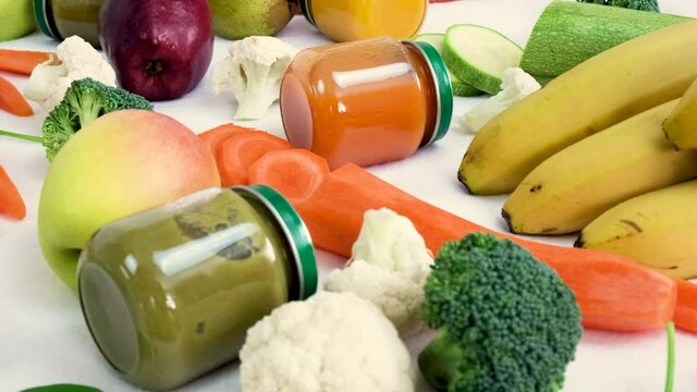 baby puree with vegetables and fruits. selective focus.