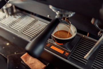 Fototapeta na wymiar coffee making staff in cafe, espresso machine