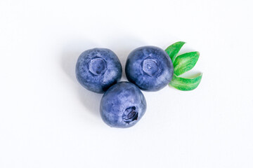 fresh blueberries with green leaves Isolated on white background