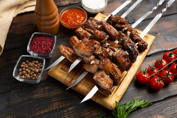 barbecue lamb ribs on cutting board on wooden table