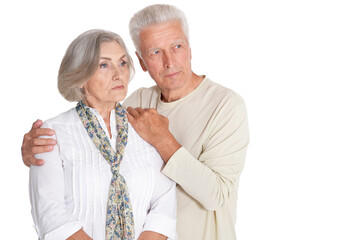 Portrait of sad senior couple