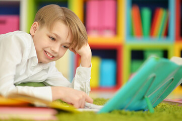 Cute little boy doing homework