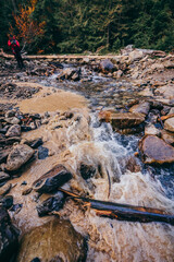 A large waterfall over a rocky cliff