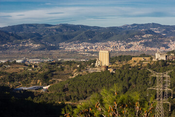 Fototapeta premium Factory in the middle of the mountain