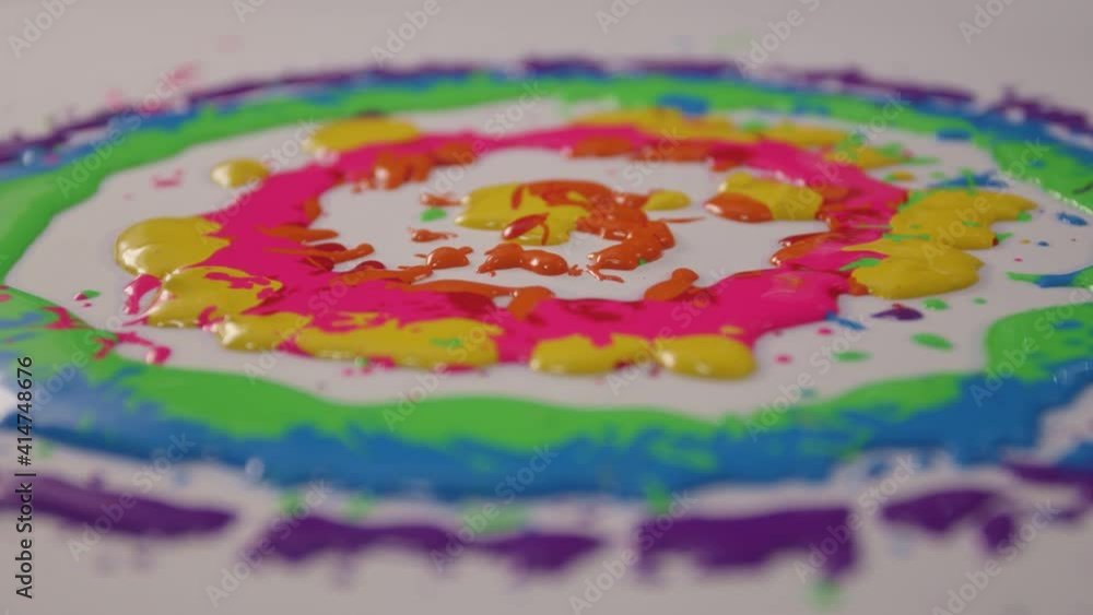 Poster the orange color gradually drops to the center on various colored areas that radiate a circle that i
