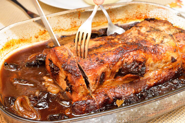 Delicious roast pork loin with plum for christmas dinner.